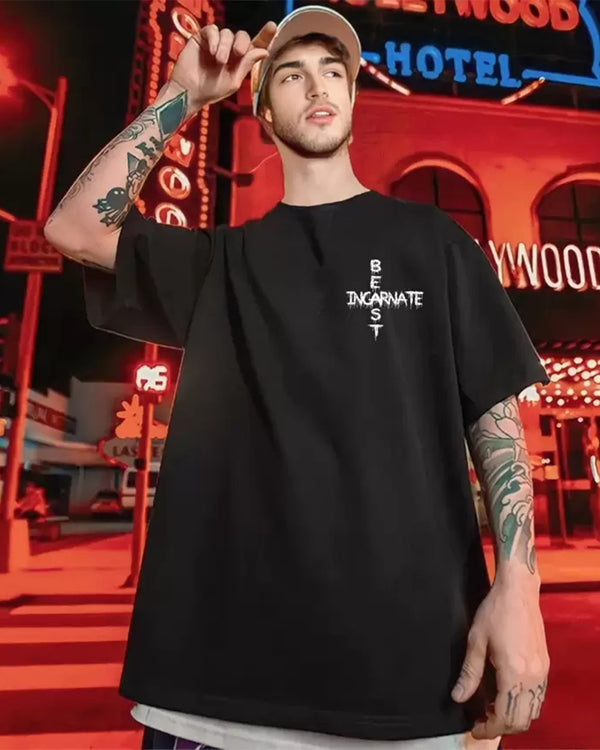 model wearing oversized thsirt for men with cap