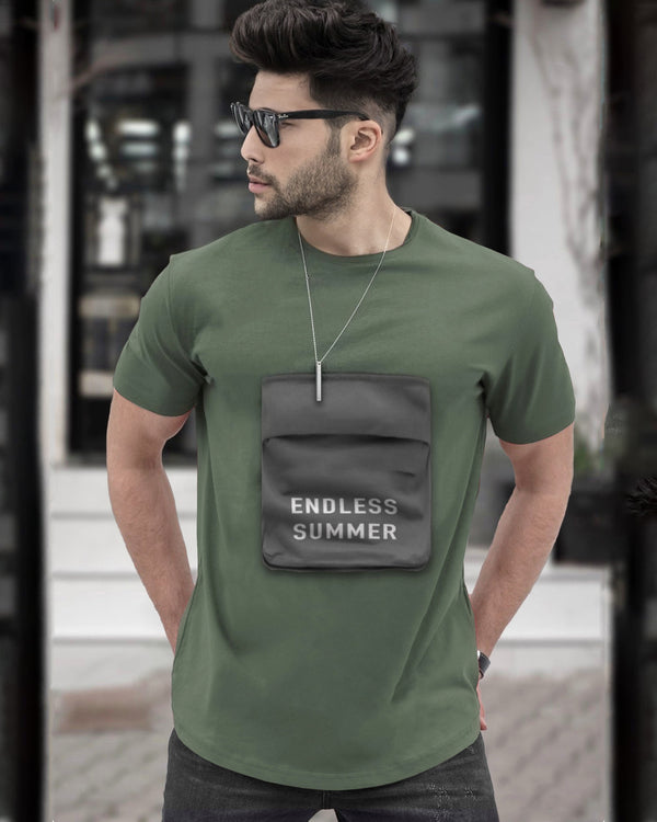 model wearing olive green t shirt and also wears neck chain and black coolers