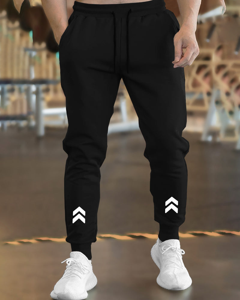 Men Solid Black TrackPant with Cuffed Ankles