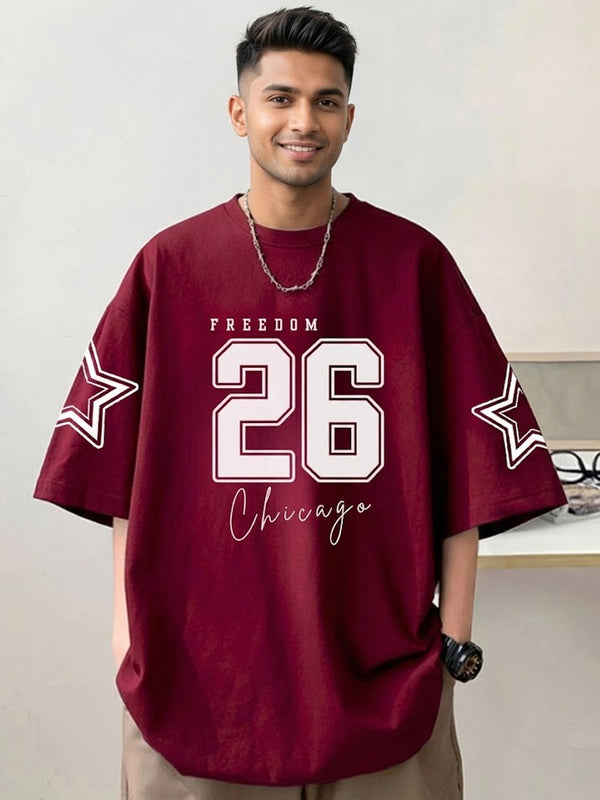 Man wearing a maroon jersey with 'Freedom 26 Chicago' text and star designs.