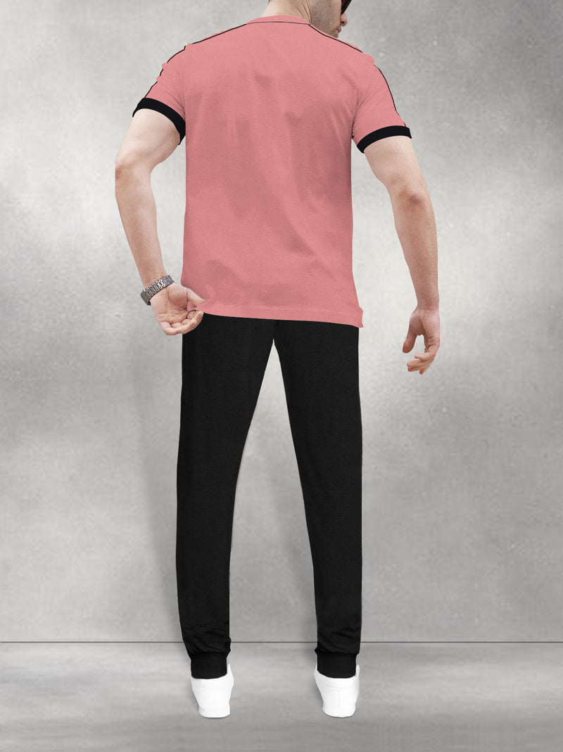 mens tracksuit pink t-shirt with black jogger