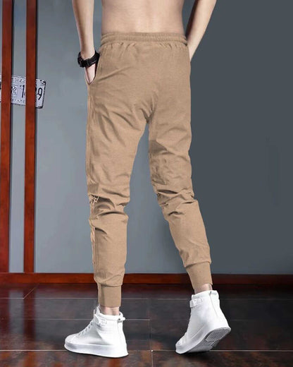 Men Beige & Black Star Printed Cuffed Trackpant