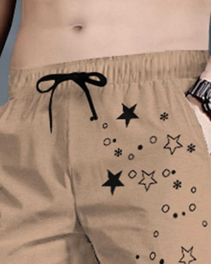 Men Beige & Black Star Printed Cuffed Trackpant