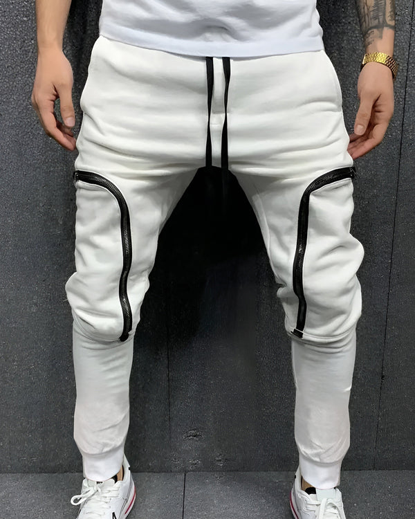 Model wearing zip pocket white cargo pant with white sneakers
