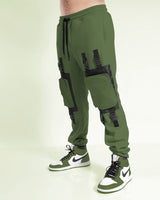 Model wearing olive green Clip Buckle cargo pant with sneakers 