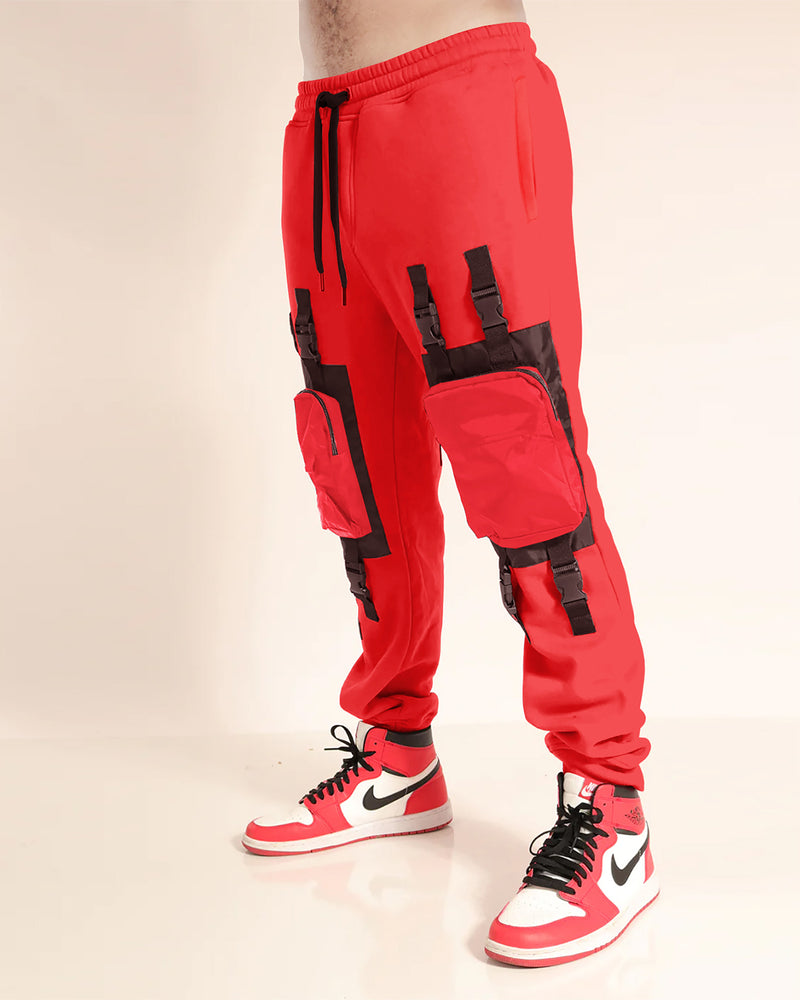 Model wearing red clip buckle cargo pant with sneakers 