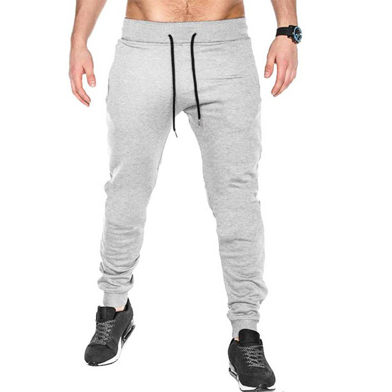 solid running track pant for men grey colour front view